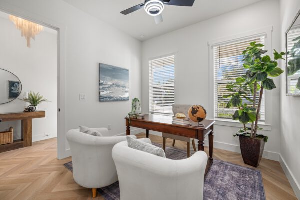 WinWay Homes Home Office with Desk, Two Accent Chairs, Corner Windows & Light Herringbone Flooring
