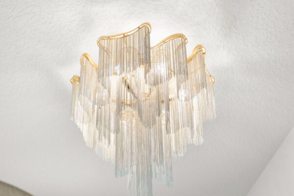 WinWay Homes Tiered Crystal Chandelier Detail with Gold Frame and Cascading Glass Strands