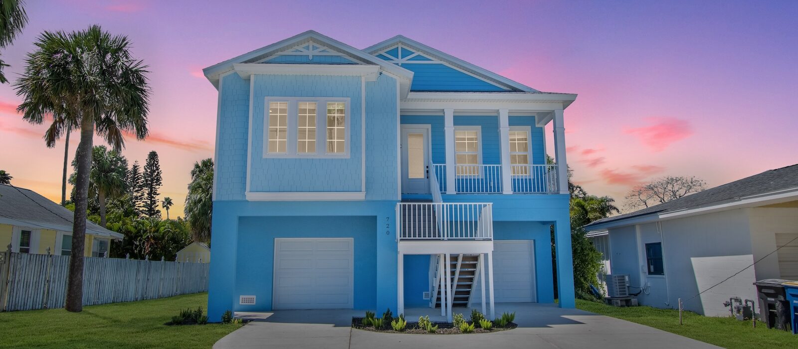 A Beautiful Elevated Home in Blue and White in St. Petersburg with Hurricane-Resistant Features by WinWay Homes