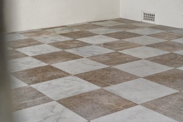 WinWay Homes Tile Flooring Detail with Beige and Cream Checker Pattern, Large Square Tiles & Stone-Look Finish