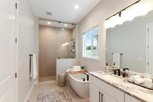WinWay Homes Spa Bathroom with Freestanding Tub, Walk-In Shower, Quartz Vanity & Light Tile Flooring