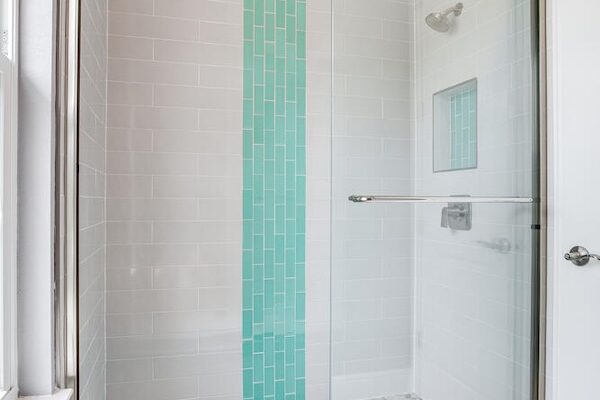 WinWay Homes Walk-In Shower with Aqua Accent Tile, Glass Enclosure, White Tile Walls & Built-In Niche