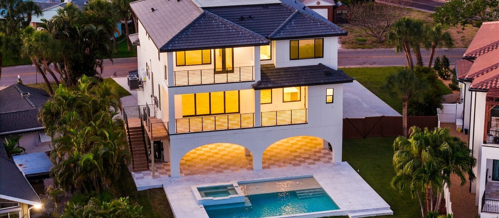 Stunning Elevated Home with 2 Stories Plus Ground-Level Patio with Modern Pool by WinWay Homes