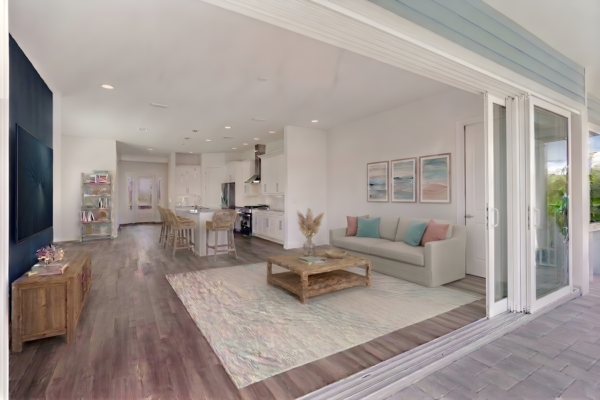 WinWay Homes Open Concept Living Area With Kitchen, Open Living Room to Patio, Sofa Seating, Sliding Glass Doors & Indoor-Outdoor Coastal Design