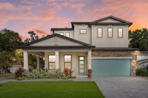 Stunning New WinWay Home at Sunset with Impact-Rated Windows and Teal Green Doors