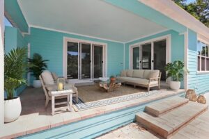 Custom Home Covered Lanai in Aqua and White by WinWay Homes in Clearwater, FL