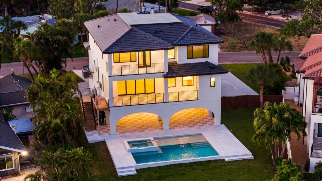 Stunning Elevated Home with 2 Stories Plus Ground-Level Patio with Modern Pool by WinWay Homes